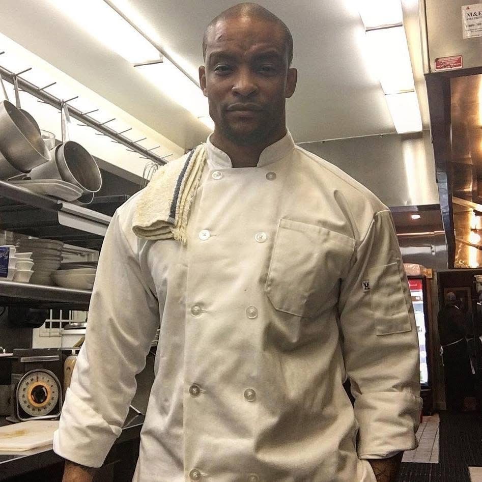 Norman Kai Lee, founder of Savrli Studios, in chef whites